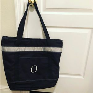 Cooler with an “O” monogram...never used!